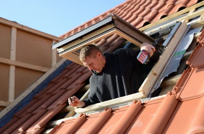 Pose de fenêtres de toit Velux à Burbach